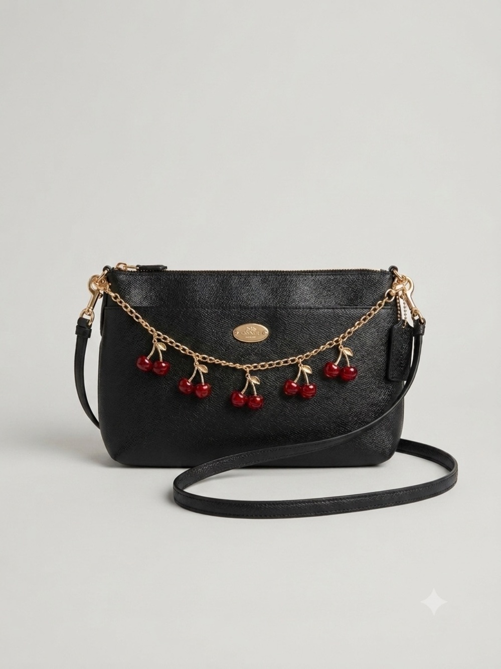 Coach Black East West Crossbody Bag with Red Cherry Chain